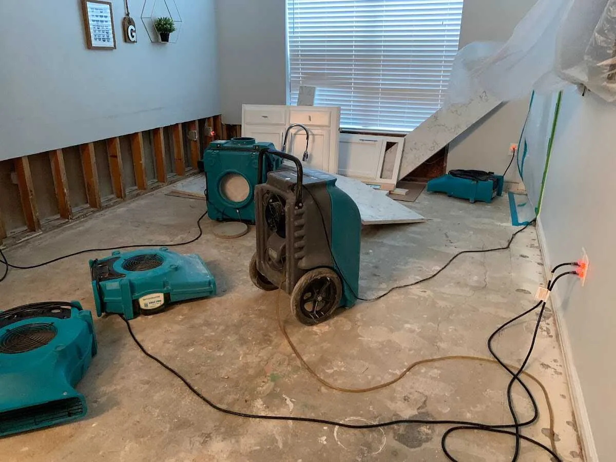 Dehumidifier in flood-cut room for Water Damage Restoration in Rolling Meadows